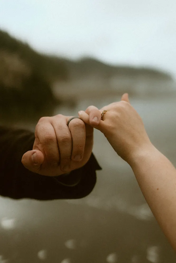 Hands linked together