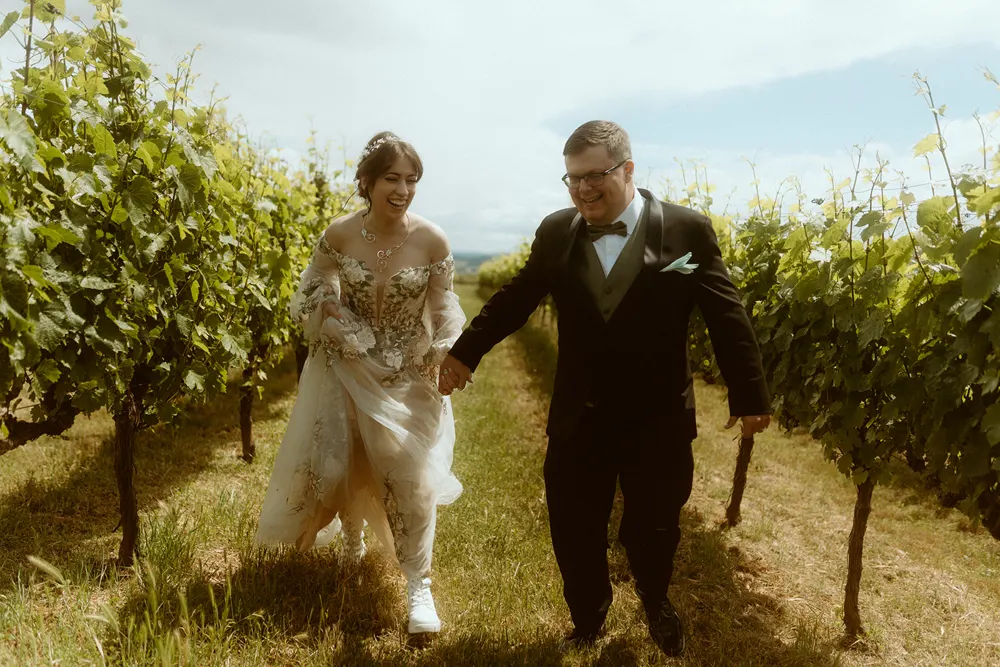 Walking hand in hand through the vineyard