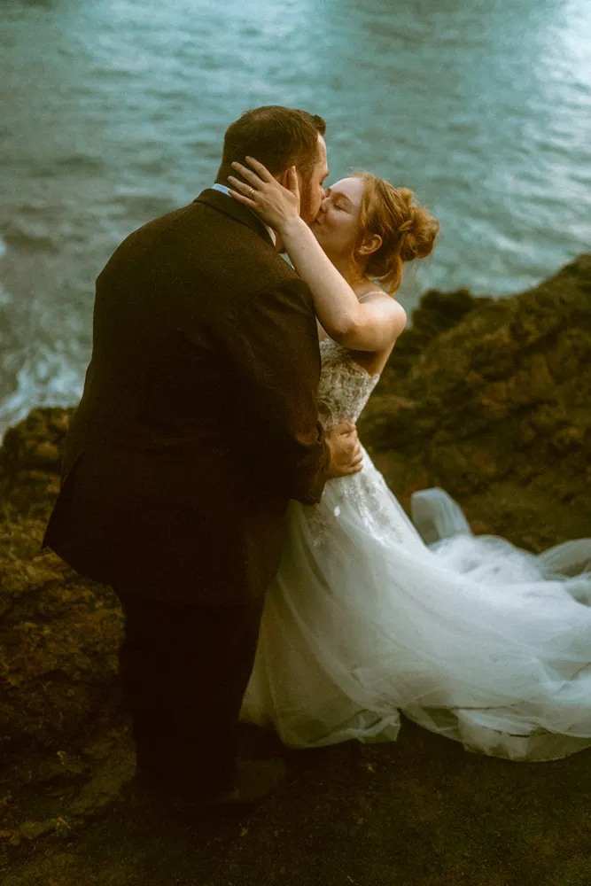 An embrace by the coast