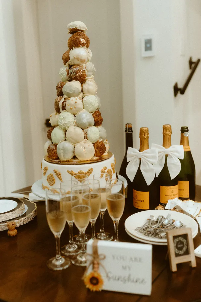 Cake, pastries, and champagne at the Airbnb